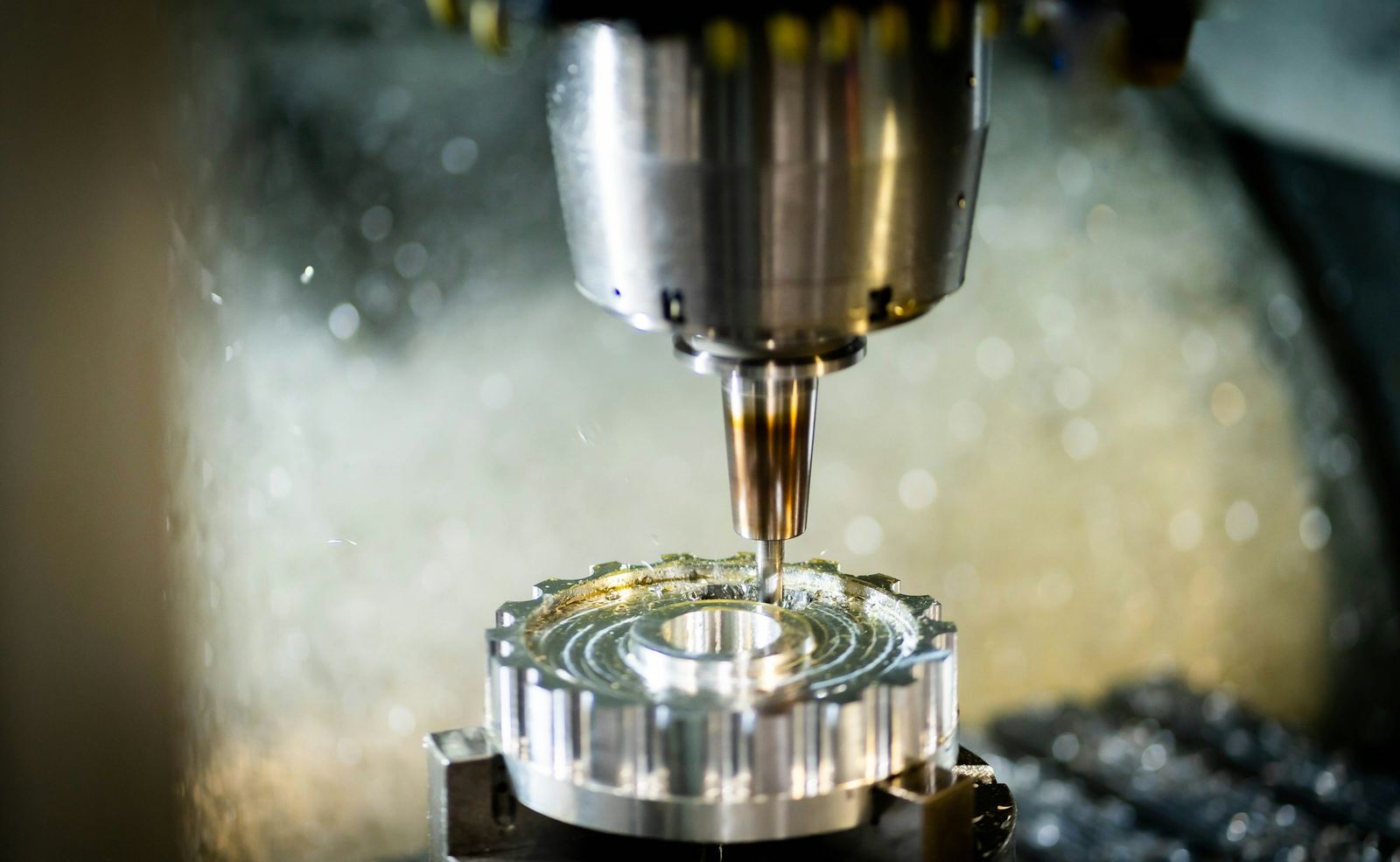 Carbide cutting tool machining a precision aluminum part in a CNC mill